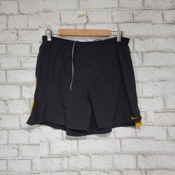Nike Pants - NIKE black and orange athletic shorts